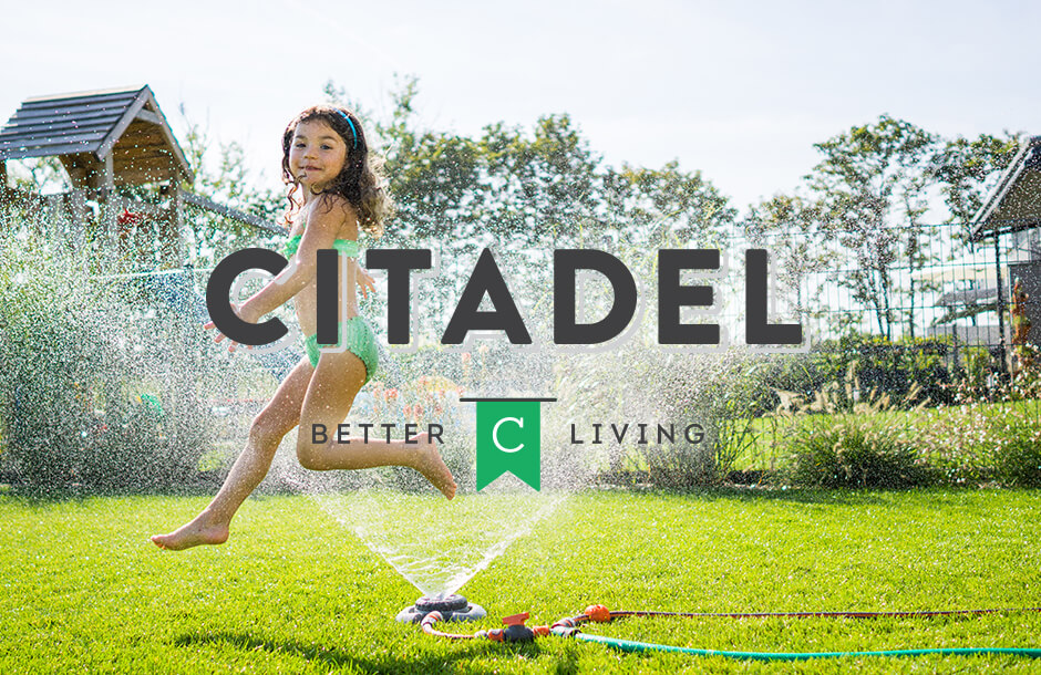 Citadel logo over community landscape